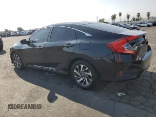 2016 Honda Civic EX with VIN 2HGFC2F74GH561164, listed as a Copart auction lot 54536215 with 86,445 mi miles and Salvage Title. Bid and sale history available at DreamBid. Image 2.