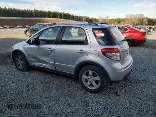 2010 Suzuki SX4 Touring with VIN JS2YB5A73A6300609, listed as a Copart auction lot 45541075 with 140,641 mi miles and Salvage Title. Bid and sale history available at carsss.com. Image 2.