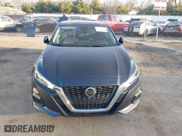 2021 Nissan Altima SV with VIN 1N4BL4DV5MN410885, listed as a IAAI auction lot 41809083 with 61,362 mi miles and . Bid and sale history available at DreamBid. Image 12.