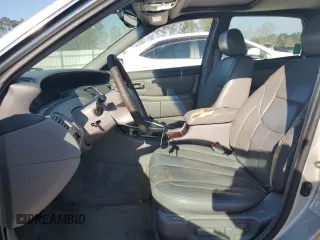 2000 Toyota Avalon XL z VIN 4T1BF28B9YU027996, wystawiony jako Copart lot #46452215 z przebiegiem 286 758 mil mil oraz Szkoda całkowita • Salvage title. Historia ofert i sprzedaży dostępna na DreamBid. Obrazek 7.