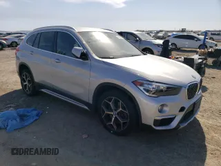 2019 BMW X1 sDrive28i with VIN WBXHU7C59K5L12043, listed as a Copart auction lot 47630763 with 53,014 mi miles. Bid and sale history available at carsss.com. Image 4.
