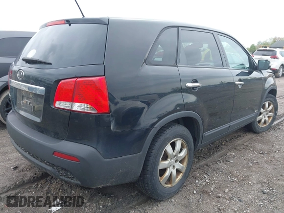 2011 Kia Sorento LX with VIN 5XYKTCA17BG172032, listed as a IAAI auction lot 42227728 with 133,681 mi miles and . Bid and sale history available at carsss.com. Image 4.