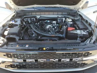 2024 Ford Bronco Wildtrak z VIN 1FMEE2BP6RLA70218, wystawiony jako Copart lot #41918605 z przebiegiem 3 782 mil mil oraz Szkoda całkowita • Salvage title. Historia ofert i sprzedaży dostępna na DreamBid. Obrazek 13.