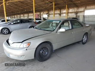 1999 Lexus ES 300 с VIN JT8BF28G9X0233078, выставлен на аукционе Copart как лот 56180915 с пробегом 136 438 миль миль и Списание • Salvage title. История ставок и продаж доступна на DreamBid. Изображение 1.