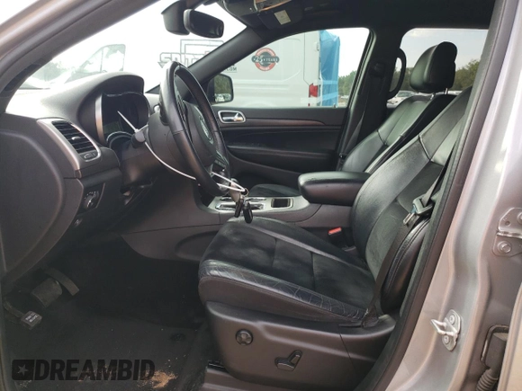 2018 Jeep Grand Cherokee Laredo E with VIN 1C4RJEAG2JC304458, listed as a Copart auction lot 45385415 with 102,172 mi miles and Salvage Title. Bid and sale history available at carsss.com. Image 7.