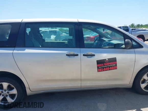 2014 Toyota Sienna L with VIN 5TDZK3DC1ES410012, listed as a IAAI auction lot 42005001 with 440,789 mi miles. Bid and sale history available at carsss.com. Image 13.