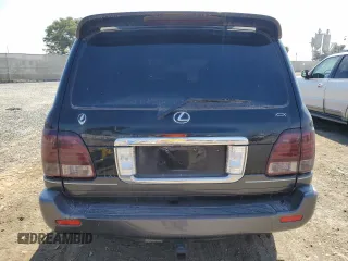 2006 Lexus LX 470 z VIN JTJHT00W264004516, wystawiony jako Copart lot #72607504 z przebiegiem 220 156 mil mil oraz Czysty tytuł • Clean title. Historia ofert i sprzedaży dostępna na DreamBid. Obrazek 6.