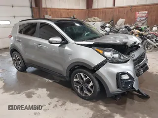 2020 Kia Sportage EX with VIN KNDPNCAC7L7752297, listed as a IAAI auction lot 42526241 with 80,977 mi miles and . Bid and sale history available at DreamBid. Image 1.