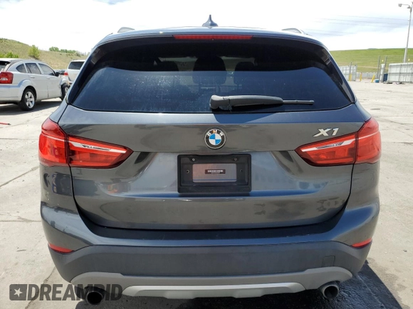 2016 BMW X1 xDrive28i z VIN WBXHT3C34GP883767, wystawiony jako Copart lot #56708375 z przebiegiem 96 285 mil mil oraz Szkoda całkowita • Salvage title. Historia ofert i sprzedaży dostępna na DreamBid. Obrazek 6.