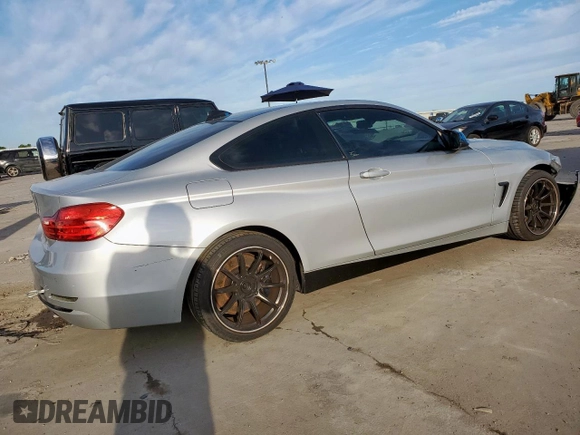 2015 BMW 4 Series 428i z VIN WBA3N3C55FK231929, wystawiony jako Copart lot #57683365 z przebiegiem 169 527 mil mil oraz Szkoda całkowita • Salvage title. Historia ofert i sprzedaży dostępna na DreamBid. Obrazek 3.