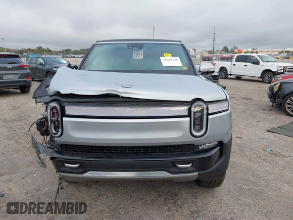 2024 Rivian R1S Adventure with VIN 7PDSGABA9RN043583, listed as a IAAI auction lot 41617148 with Not Provided miles. Bid and sale history available at carsss.com. Image 12.