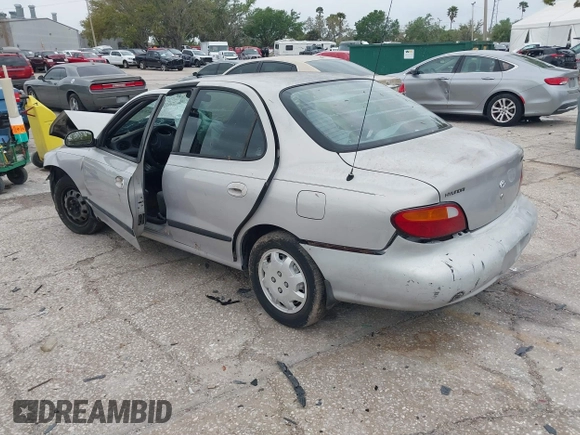 1998 Hyundai Elantra with VIN KMHJF24M7WU672436, listed as a IAAI auction lot 41763627 with 114,288 mi miles and . Bid and sale history available at DreamBid. Image 3.