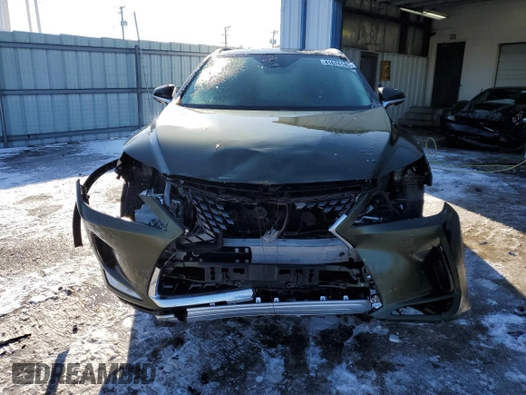 2022 Lexus RX with VIN JTJJGKFA1N2024389, listed as a Copart auction lot 41674145 with 57,791 mi miles and Salvage Title. Bid and sale history available at carsss.com. Image 5.