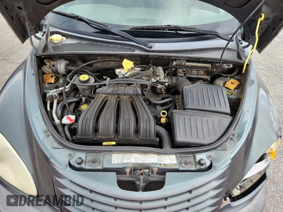 2003 Chrysler PT Cruiser with VIN 3C4FY48B23T556527, listed as a Copart auction lot 60886505 with 128,256 mi miles and Salvage title. Bid and sale history available at DreamBid. Image 11.