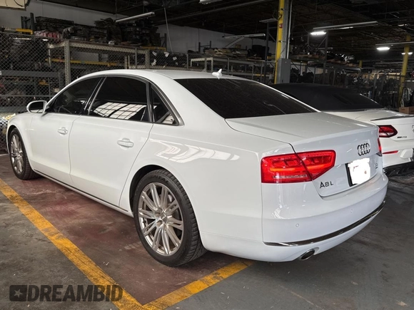 2014 Audi A8 3.0L TDI with VIN WAURMAFD2EN003811, listed as a Copart auction lot 61867575 with 120,705 mi miles and Clean title. Bid and sale history available at DreamBid. Image 3.