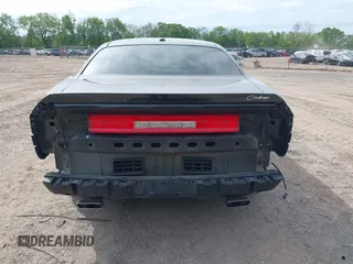 2011 Dodge Challenger z VIN 2B3CJ4DG1BH510981, wystawiony jako IAAI lot #42354382 z przebiegiem 129 050 mil mil oraz . Historia ofert i sprzedaży dostępna na DreamBid. Obrazek 17.