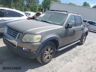 2007 Ford Explorer Sport Trac XLT with VIN 1FMEU31K97UA28843, listed as a IAAI auction lot 42066888 with 407,707 mi miles. Bid and sale history available at carsss.com. Image 2.