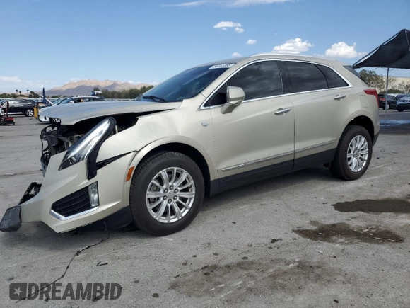 2017 Cadillac XT5 FWD with VIN 1GYKNARSXHZ158528, listed as a Copart auction lot 59761385 with 100,238 mi miles and Salvage title. Bid and sale history available at DreamBid. Image 1.