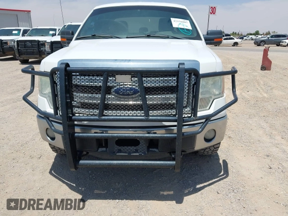 2014 Ford F-150 XL z VIN 1FTFX1EF5EKE66124, wystawiony jako IAAI lot #42256807 z przebiegiem 211 614 mil mil oraz . Historia ofert i sprzedaży dostępna na DreamBid. Obrazek 12.