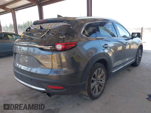 2021 Mazda CX-9 Signature with VIN JM3TCBEY9M0504963, listed as a IAAI auction lot 41756255 with 49,946 mi miles. Bid and sale history available at carsss.com. Image 4.