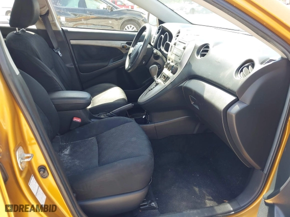 2009 Toyota Matrix S with VIN 2T1LE40E49C001740, listed as a IAAI auction lot 42088899 with 173,939 mi miles. Bid and sale history available at carsss.com. Image 5.