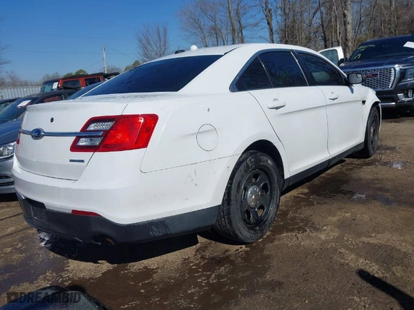 2015 Ford Sedan Police Interceptor with VIN 1FAHP2L89FG165269, listed as a IAAI auction lot 41640122 with 72,707 mi miles. Bid and sale history available at carsss.com. Image 4.