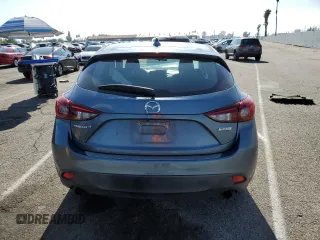 2015 Mazda 3 i Grand Touring with VIN JM1BM1M77F1247075, listed as a Copart auction lot 54559925 with 104,671 mi miles and Salvage title. Bid and sale history available at DreamBid. Image 6.