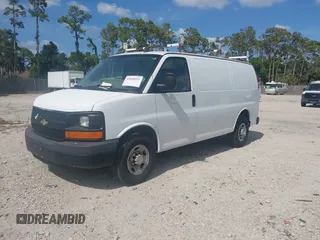 2016 Chevrolet Express Cargo Van with VIN 1GCWGAFF9G1174306, listed as a IAAI auction lot 42028351 with 154,646 mi miles. Bid and sale history available at carsss.com. Image 2.