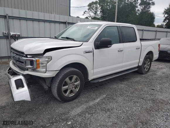 2018 Ford F-150 XL with VIN 1FTEW1CP6JKF00544, listed as a Copart auction lot 71185364 with 132,005 mi miles and Salvage Title. Bid and sale history available at carsss.com. Image 1.