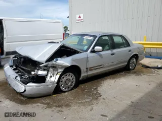 2003 Mercury Grand Marquis GS Convenience with VIN 2MEFM74W93X654361, listed as a Copart auction lot 63485294 with 165,569 mi miles and Salvage Title. Bid and sale history available at carsss.com. Image 1.