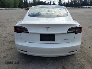 2023 Tesla Model 3 Long Range with VIN 5YJ3E1EB1PF603100, listed as a Copart auction lot 54945865 with 22,865 mi miles and Salvage Title. Bid and sale history available at DreamBid. Image 6.
