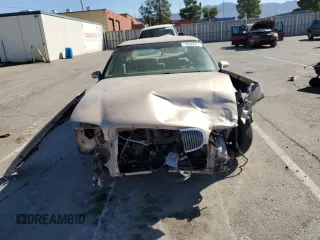 1999 Buick LeSabre Limited with VIN 1G4HR52KXXH495657, listed as a Copart auction lot 76689074 with 154,672 mi miles and Salvage Title. Bid and sale history available at DreamBid. Image 5.