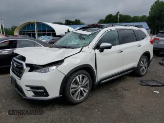 2019 Subaru Ascent Touring with VIN 4S4WMARD1K3446794, listed as a Copart auction lot 63557035 with 60,794 mi miles and Salvage title. Bid and sale history available at DreamBid. Image 1.