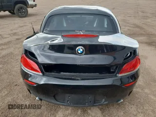2011 BMW Z4 sDrive35i z VIN WBALM7C51BE383595, wystawiony jako Copart lot #54887695 z przebiegiem Nie podano mil oraz Szkody całkowita. Historia ofert i sprzedaży dostępna na DreamBid. Obrazek 6.