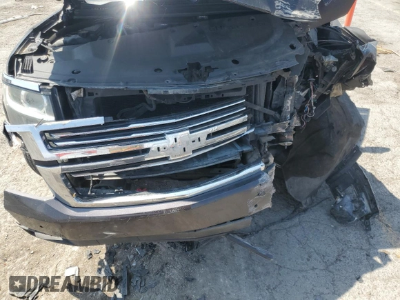2015 Chevrolet Tahoe LTZ with VIN 1GNSKCKC2FR157035, listed as a Copart auction lot 59990415 with Not provided miles and Salvage title. Bid and sale history available at DreamBid. Image 12.