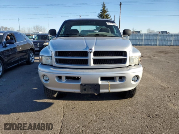 2001 Dodge Ram 2500 with VIN 3B7KF23Z31G821023, listed as a Copart auction lot 82185604 with 77,364 mi miles and Clean Title. Bid and sale history available at carsss.com. Image 5.