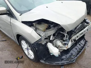 2015 Ford Focus SE with VIN 1FADP3F26FL299112, listed as a IAAI auction lot 41492446 with 57,103 mi miles. Bid and sale history available at carsss.com. Image 18.