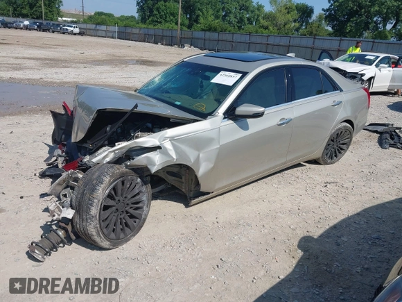 2015 Cadillac CTS Luxury AWD with VIN 1G6AX5SX7F0133440, listed as a IAAI auction lot 42560857 with 82,910 mi miles and . Bid and sale history available at DreamBid. Image 2.