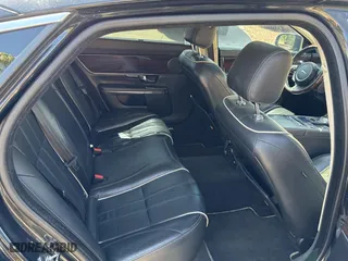 2012 Jaguar XJ with VIN SAJWA2GBXCLV24464, listed as a Copart auction lot 52572955 with NaN miles and Clean Title. Bid and sale history available at carsss.com. Image 6.