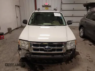 2012 Ford Escape XLT z VIN 1FMCU9DG4CKA72675, wystawiony jako IAAI lot #41212739 z przebiegiem 112 781 mil mil oraz . Historia ofert i sprzedaży dostępna na DreamBid. Obrazek 13.
