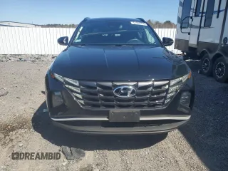 2023 Hyundai Tucson SEL z VIN 5NMJBCAEXPH221710, wystawiony jako Copart lot #51915715 z przebiegiem 21 771 mil mil oraz Szkoda całkowita • Salvage title. Historia ofert i sprzedaży dostępna na DreamBid. Obrazek 5.