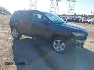2020 Jeep Compass Latitude with VIN 3C4NJDBB4LT106967, listed as a IAAI auction lot 41719873 with 67,326 mi miles. Bid and sale history available at carsss.com. Image 1.