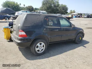 2002 Mercedes-Benz M-Class with VIN 4JGAB54E32A338132, listed as a Copart auction lot 67854164 with 0 mi miles and Salvage Title. Bid and sale history available at carsss.com. Image 3.