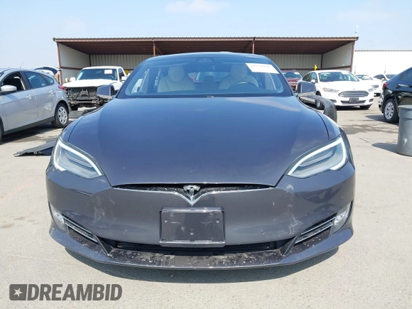 2020 Tesla Model S Long Range with VIN 5YJSA1E24LF415849, listed as a IAAI auction lot 42571945 with 34,398 mi miles and . Bid and sale history available at DreamBid. Image 13.