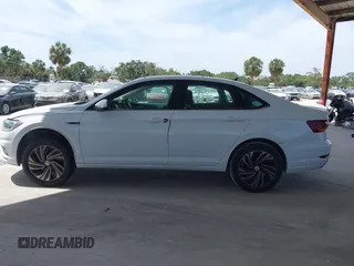 2019 Volkswagen Jetta SEL Premium z VIN 3VWGB7BU6KM168451, wystawiony jako IAAI lot #42090183 z przebiegiem 75 851 mil mil oraz . Historia ofert i sprzedaży dostępna na DreamBid. Obrazek 13.