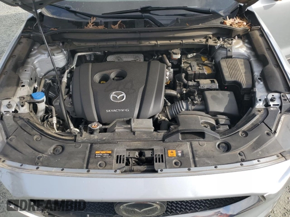 2021 Mazda CX-5 Touring with VIN JM3KFACM2M0451083, listed as a Copart auction lot 49999935 with 59,927 mi miles and Salvage Title. Bid and sale history available at carsss.com. Image 12.