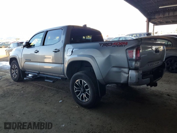 2021 Toyota Tacoma SR with VIN 3TMCZ5AN6MM393306, listed as a Copart auction lot 41483325 with 57,217 mi miles and Salvage title. Bid and sale history available at DreamBid. Image 2.