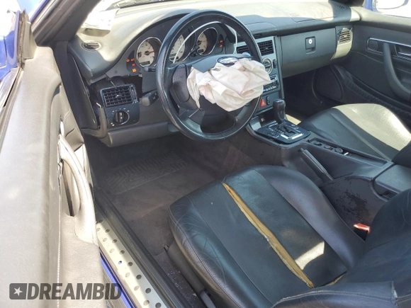 1998 Mercedes-Benz SLK 230/320 with VIN WDBKK47F7WF067901, listed as a Copart auction lot 55122585 with 76,748 mi miles and Salvage title. Bid and sale history available at DreamBid. Image 8.