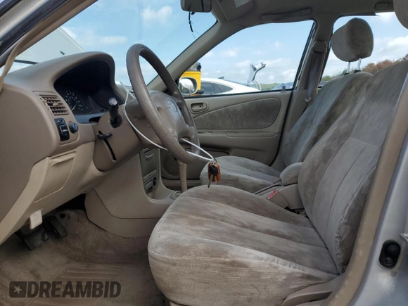 1999 Toyota Corolla VE with VIN 2T1BR12E7XC113103, listed as a Copart auction lot 63849025 with 104,830 mi miles and Salvage title. Bid and sale history available at DreamBid. Image 7.
