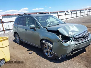 2015 Subaru Forester Touring with VIN JF2SJAWC4FH488782, listed as a IAAI auction lot 42650646 with 154,866 mi miles and . Bid and sale history available at DreamBid. Image 1.